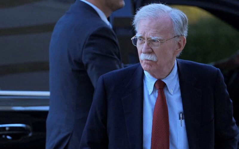 Bolton arrives at court to surrender himself to authorities on charges in a classified information case