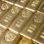 Gold falls from record high with biggest one-day drop in 12 years