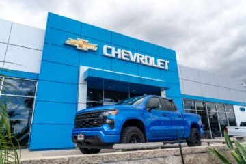 Auto stocks rise as automakers handle policy shifts with “strong” sales.