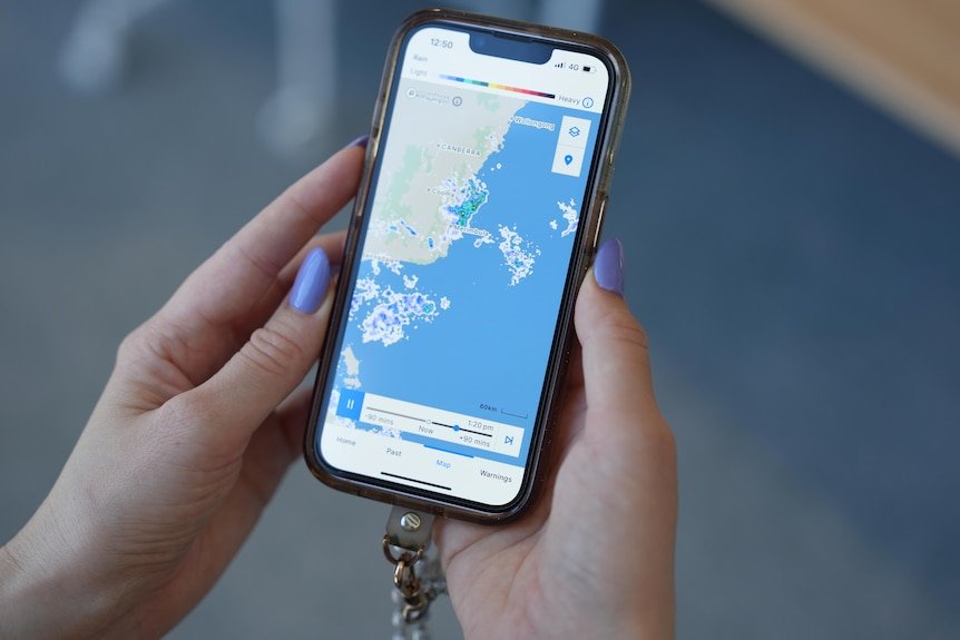 A person looks at the Bureau of Meteorology