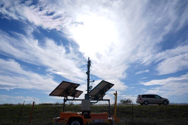 A license plate reader used by U.S. Border Patrol sits along US Highway 191, Thursday, Oct. 23, 2025, in Douglas, Ariz. (AP Photo/Ross D. Franklin)