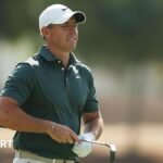 Rory McIlroy tightens his grip on the Race to Dubai title after an impressive opening round