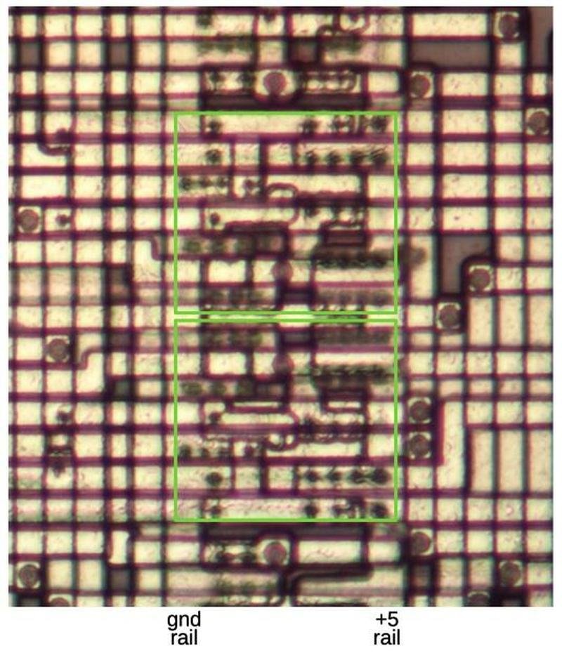 Two CMOS switches, highlighted in green. The lower switch is flipped vertically compared to the upper switch.