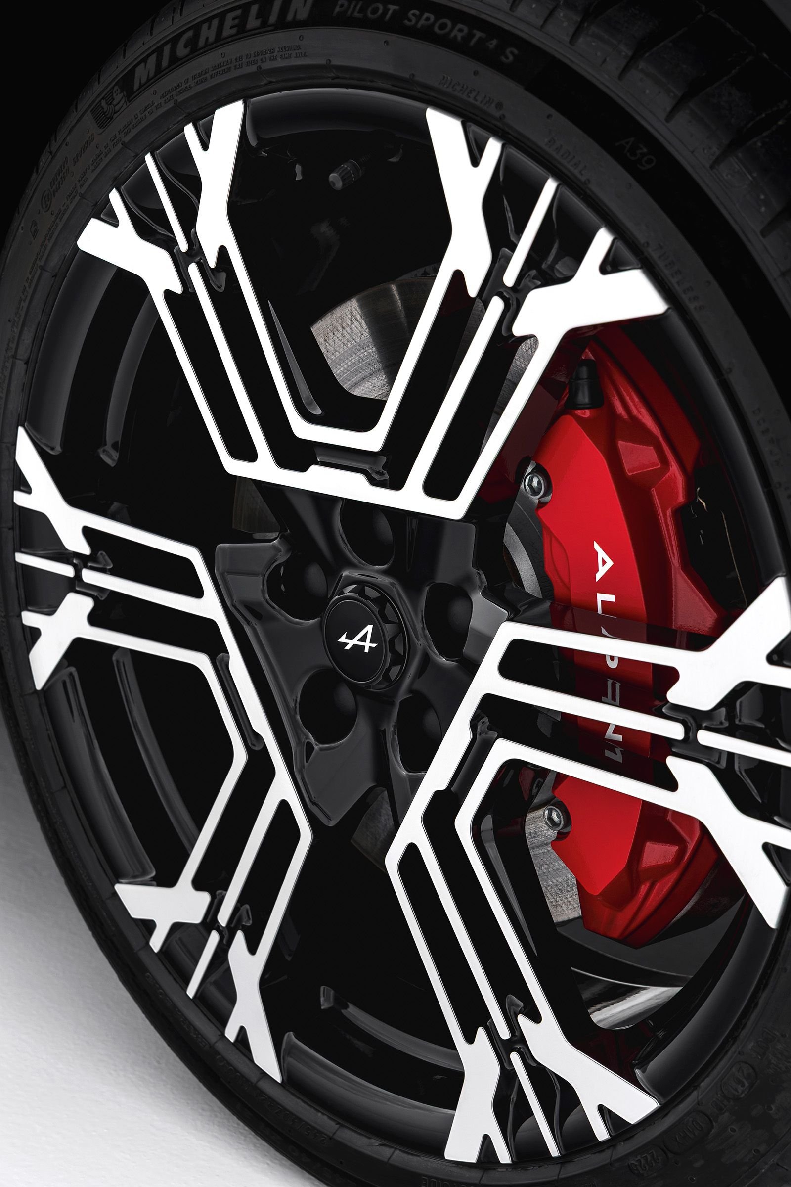 Image may contain machine wheel, car alloy wheel, car wheel, tire, transport vehicle and bicycle