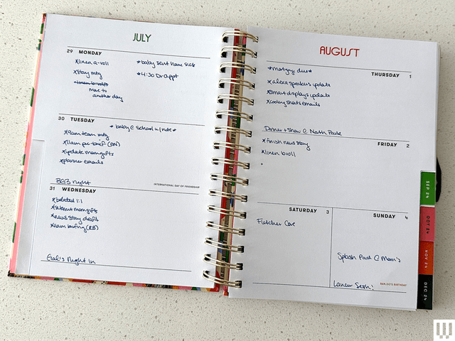 Open-loop paper chart lies flat on a white surface, and the pages show notes for the end of July and the beginning of August