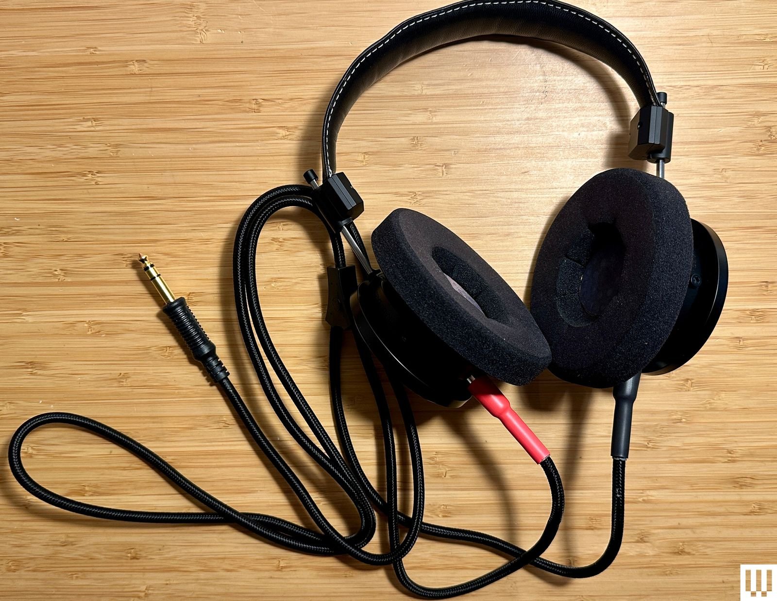 Top view of a pair of black headphones