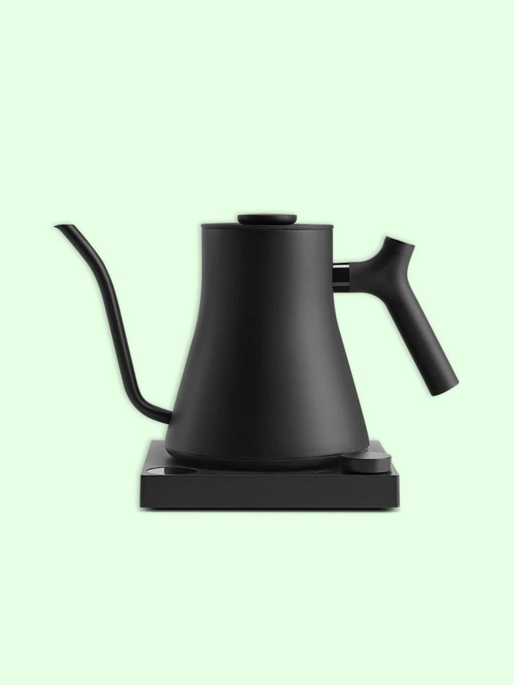 The image may contain: cooking utensils, pot, and kettle