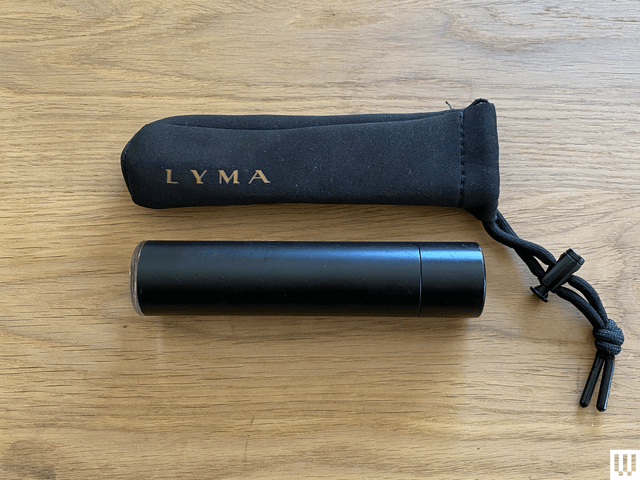 Image may contain: electrical device, microphone, accessories, belt and lamp