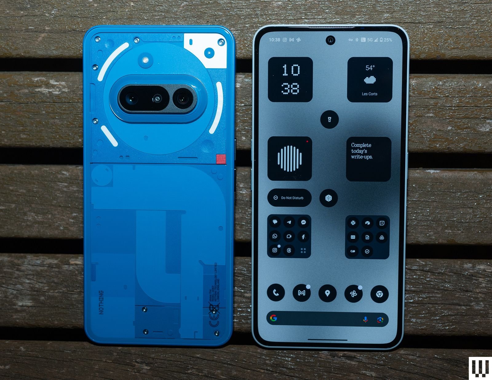 Back and front view of Nothing Phone 3A, a blue mobile phone with app icons on the screen