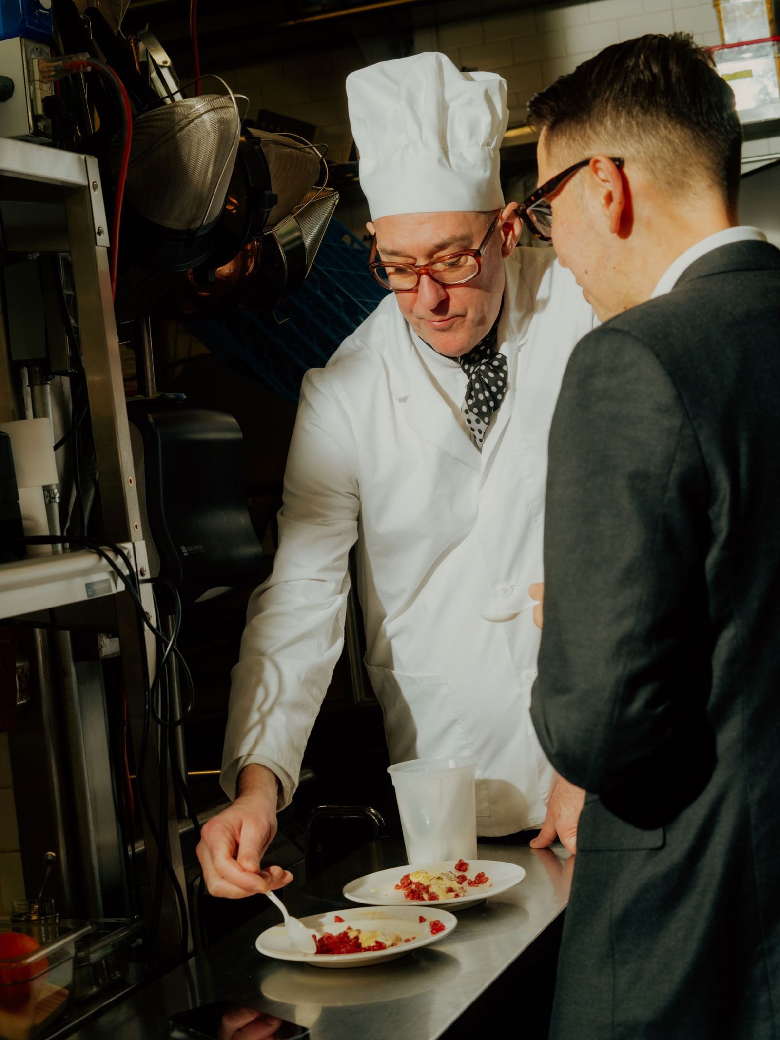 The chef prepares a dish.