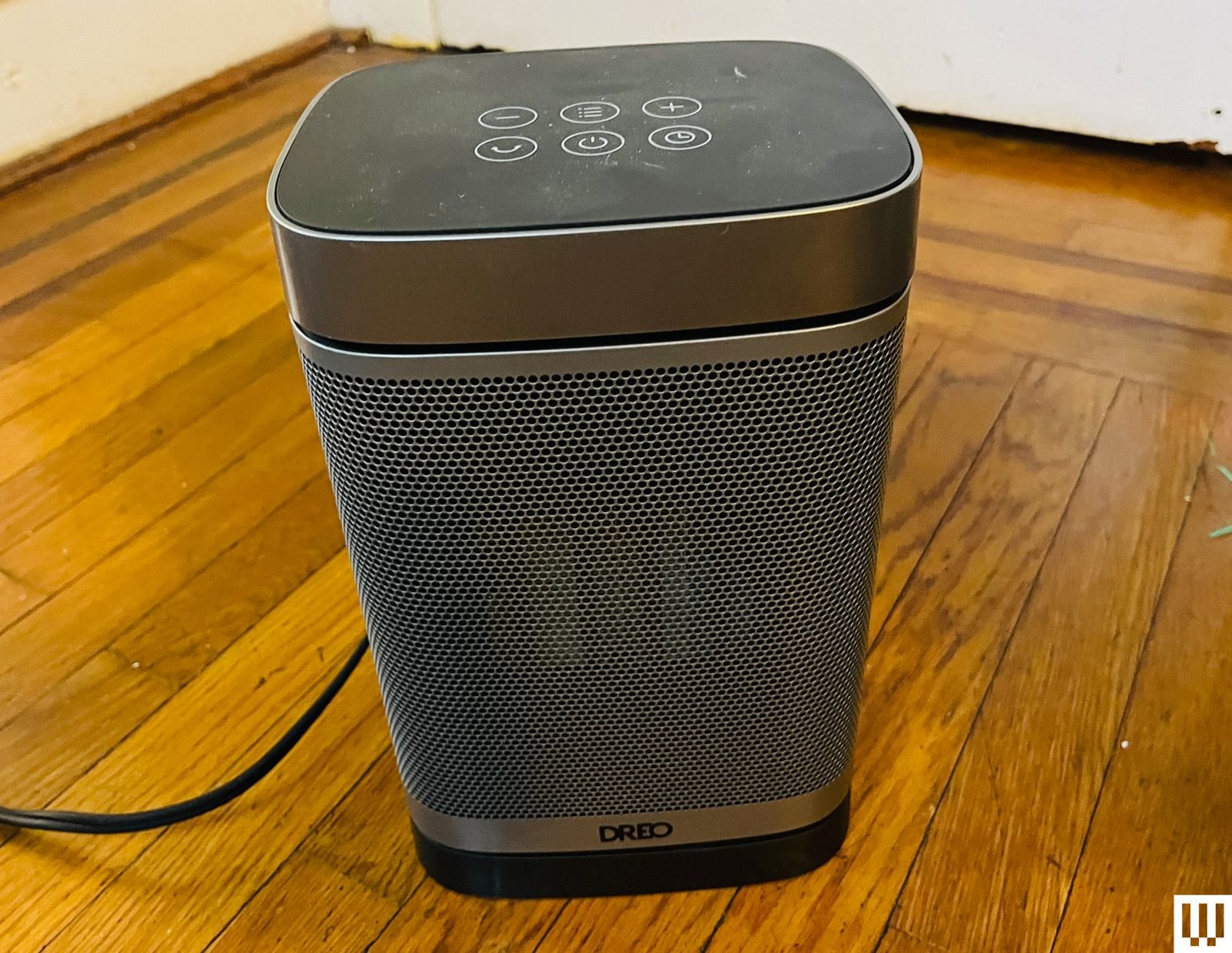 Space Heater Buying Guide Dreo Brand heater on wood floor
