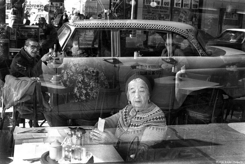 Woman sitting in the window at Dubrow