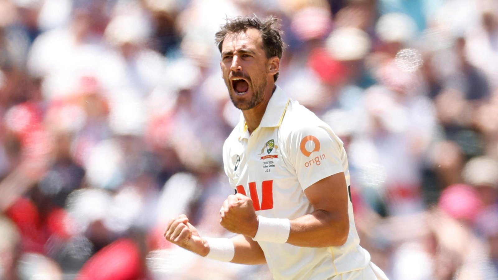 Mitchell Starc celebrates his wicket