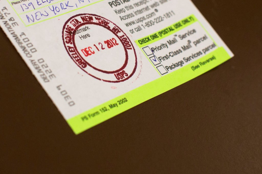 A US postmark displays the date in New York