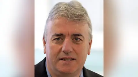 Blackpool creator Steve Richardson has short, thick gray hair.