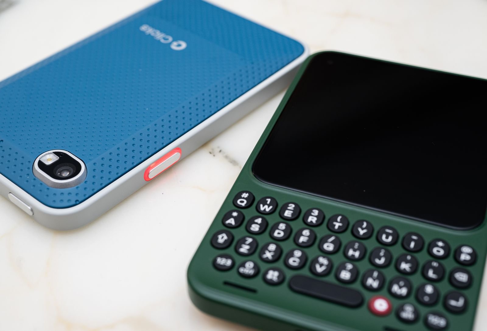 Image may contain electronics, telephone and mobile phone