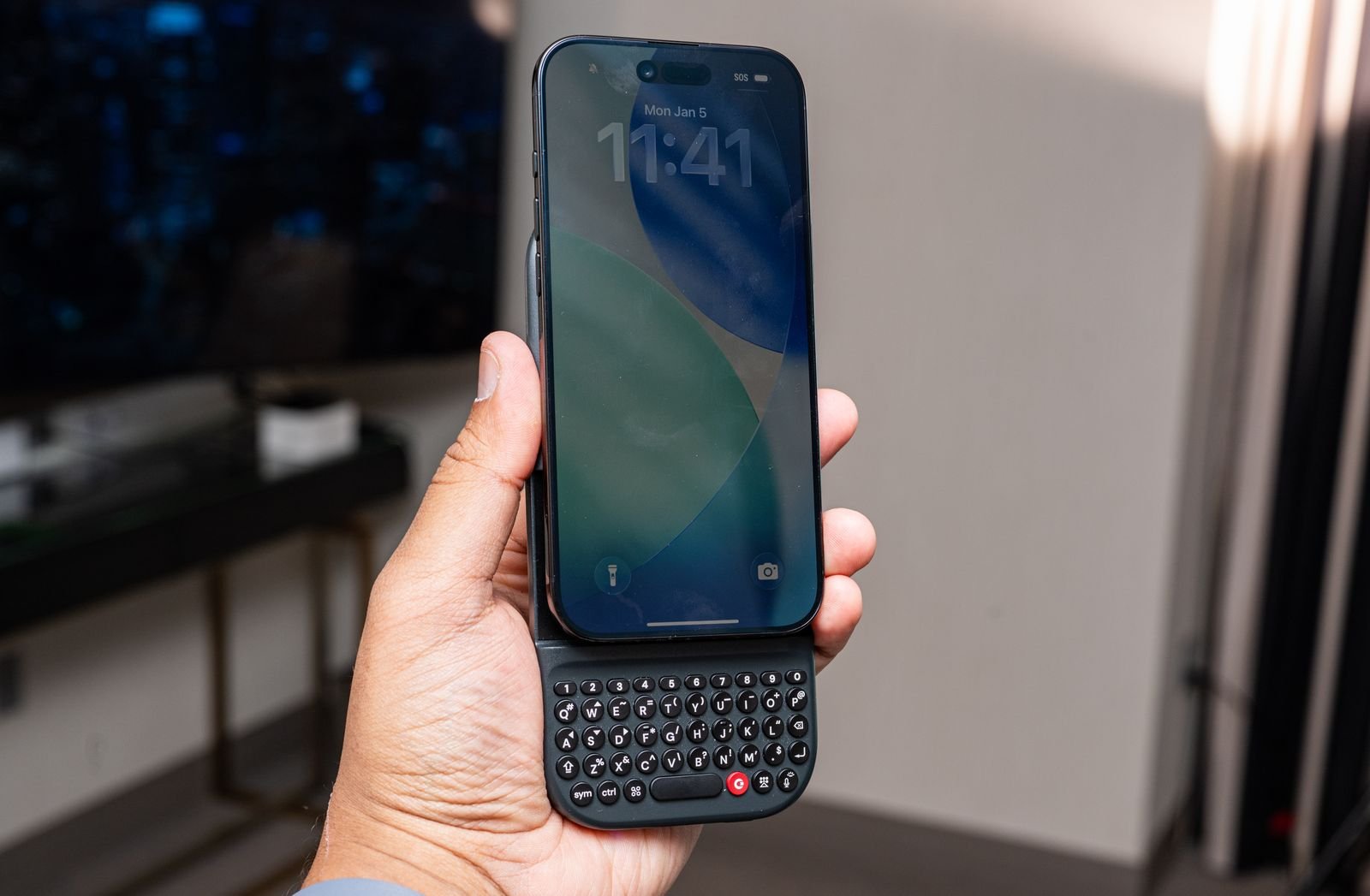 Image may contain electronics cell phone phone and iphone