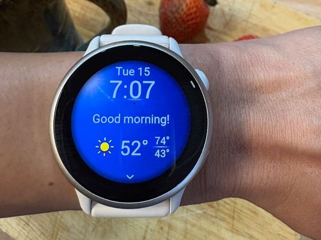 Image may contain: electronics, screen, computers, hardware, screen, watch, arm, body part, person, and baby