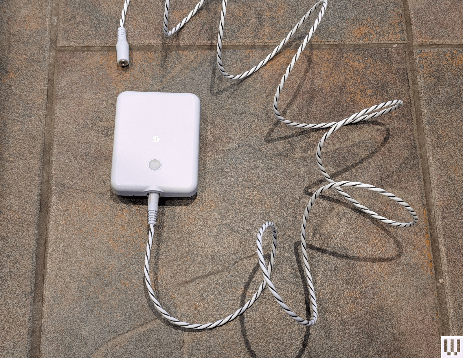 The image may contain electronic devices and a phone