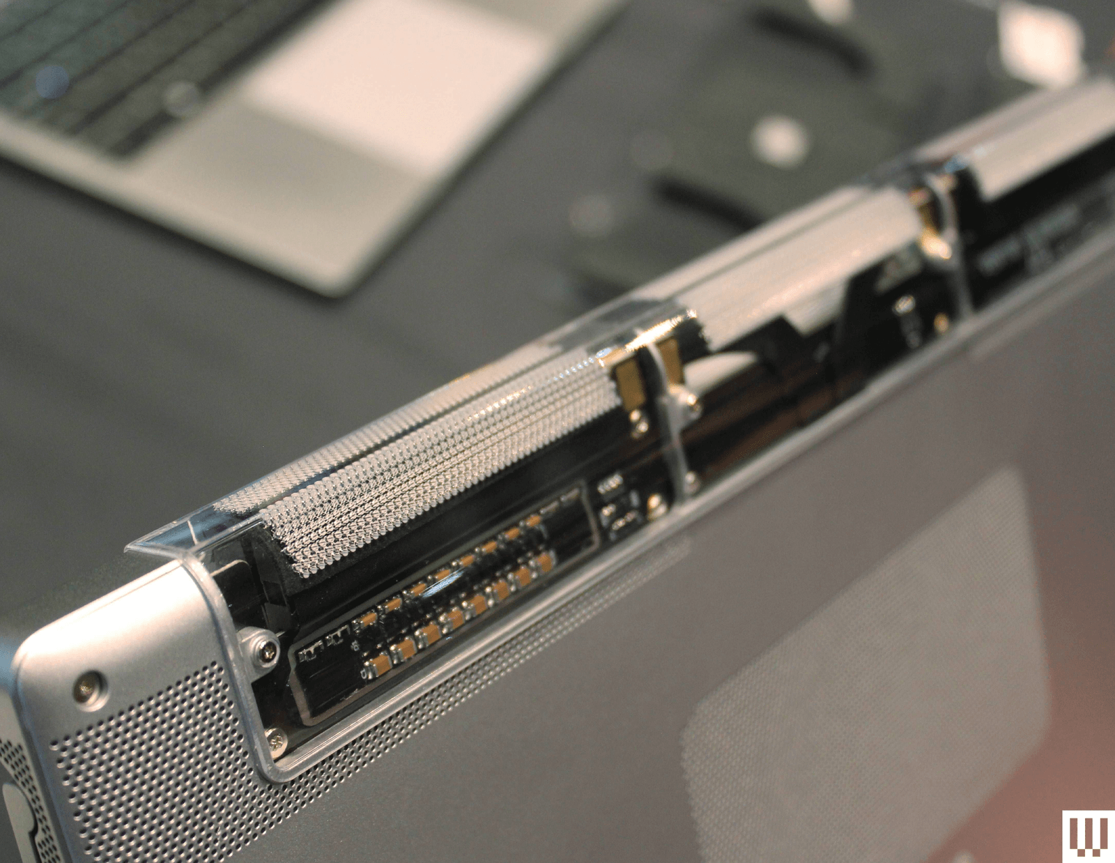 The image may contain computers, electronic devices and computers