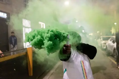 Anatolia via Getty Images Senegalese fans take to the streets and celebrate after winning the final match of the Africa Cup of Nations between the Moroccan and Senegalese national teams in Milan, Italy.