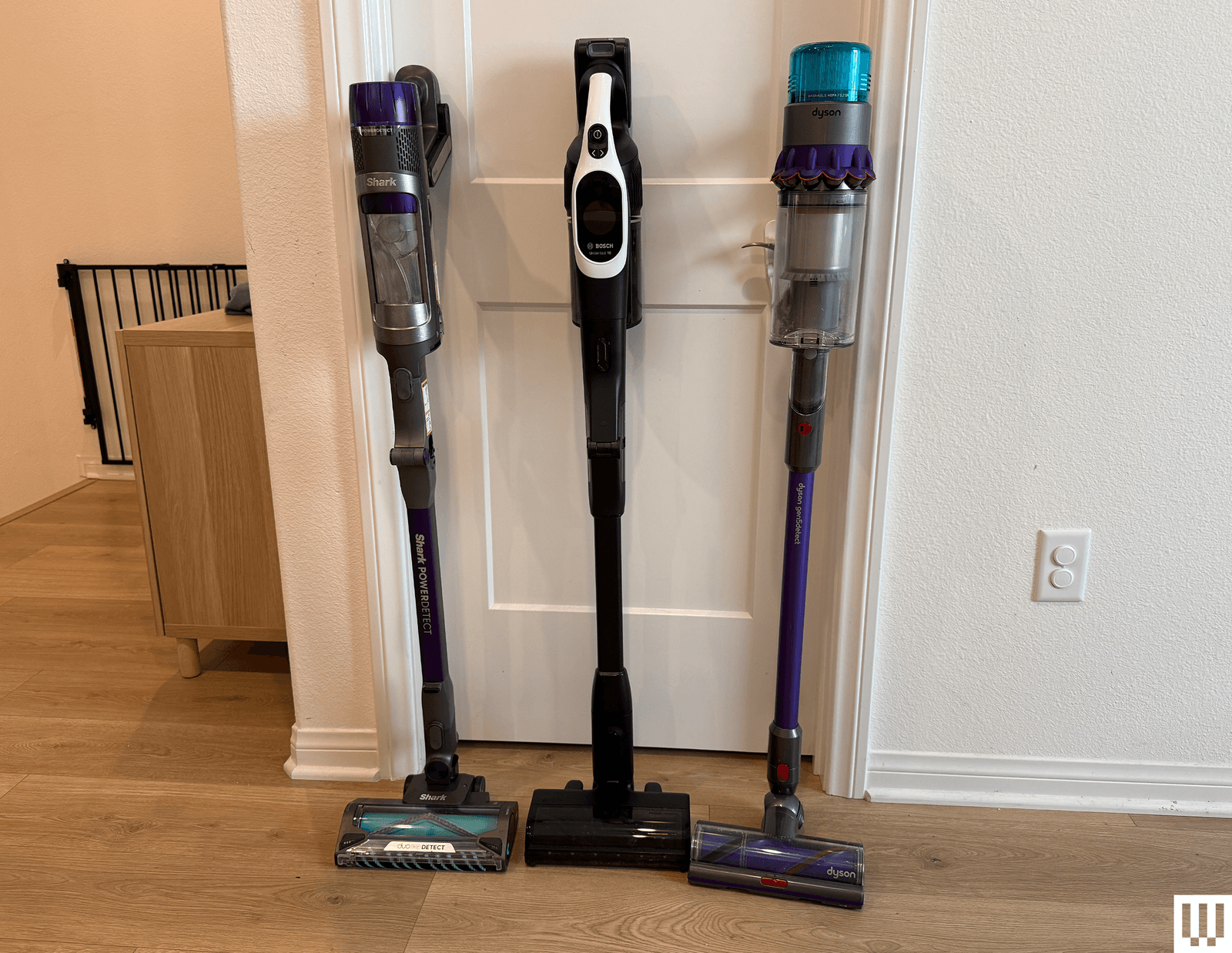 The image may contain a device, an electrical appliance, a vacuum cleaner, a mace and a weapon