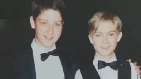 Hunter family Snooker players Matthew Stevens and Paul Hunter, pictured together as teenagers. They all wear ties and white shirts. Hunter wears a waistcoat, while Stevens wears a suit jacket. Stevens, left, puts his arm around his friend
