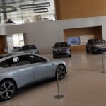 Why is the largest American car dealer not interested in Chinese cars?