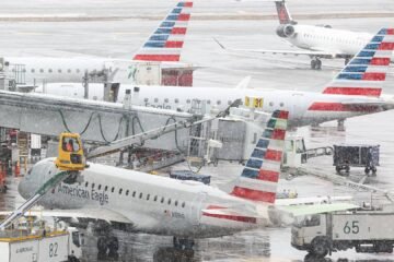 Airlines cancel thousands of flights due to a snow storm that paralyzes the East Coast