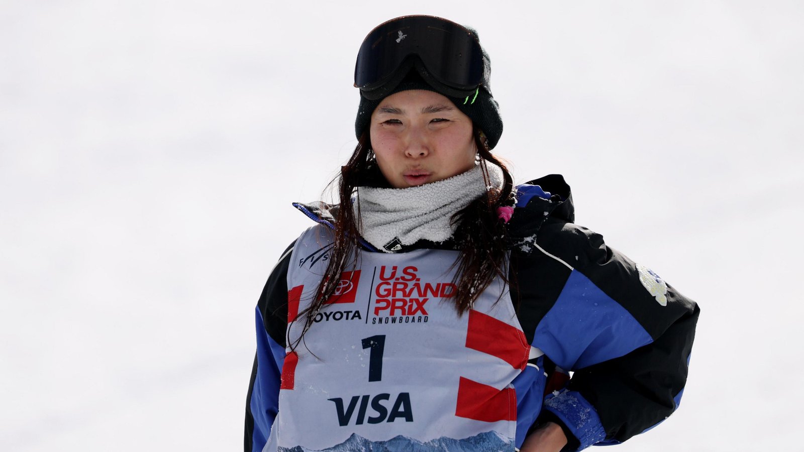 Chloe Kim of the United States reacts to the injury she sustained while training before competing in the women