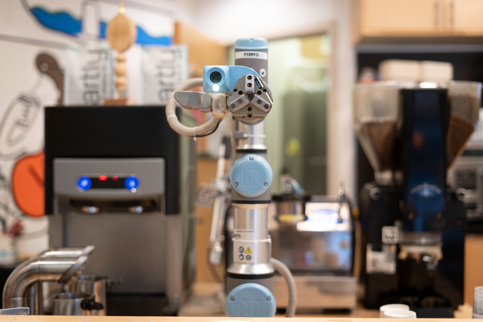 Robot barista claw shown from straight on