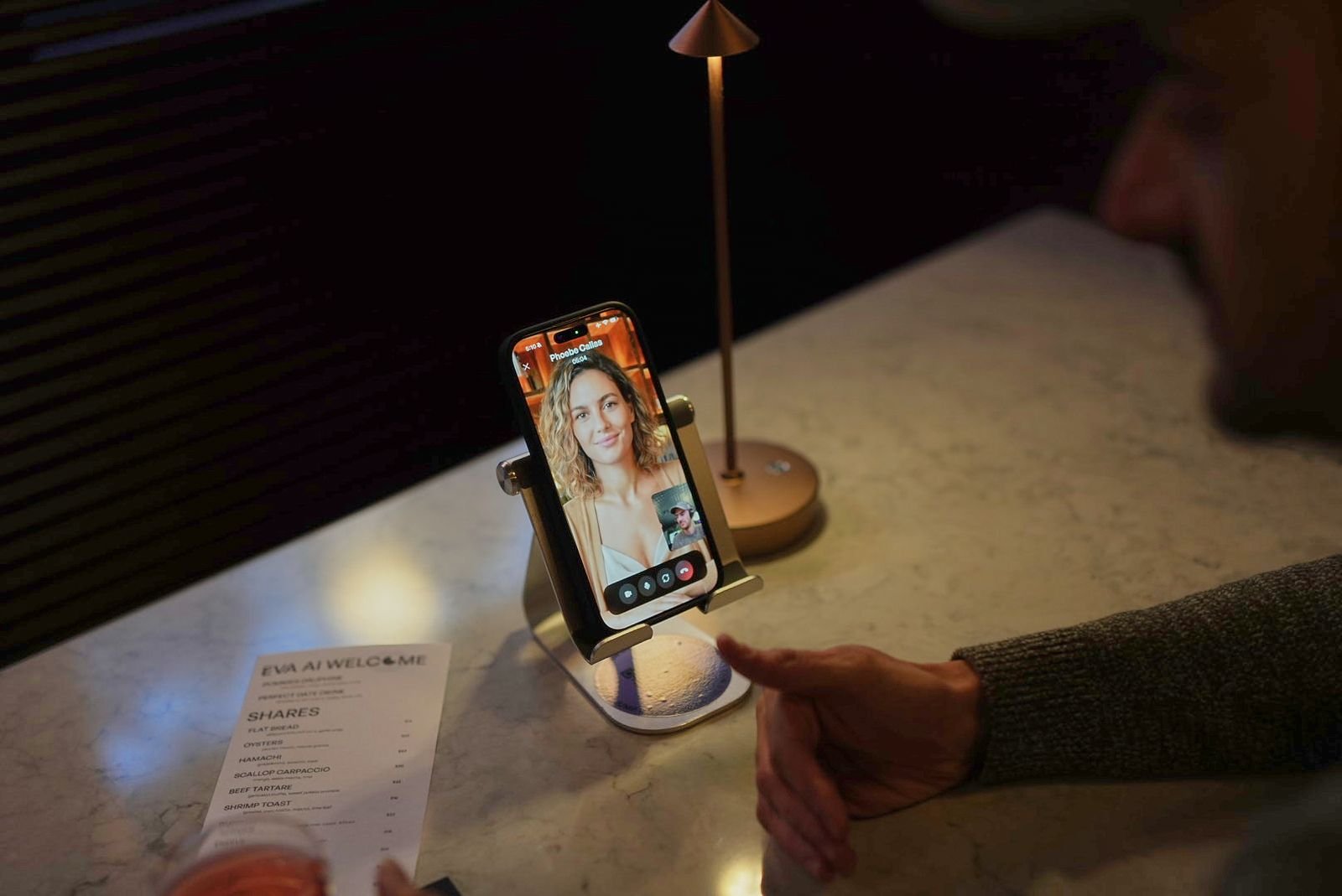 Image may contain marta menegatti lamp, photography, electronics, phone, mobile, person, child, adult and wedding