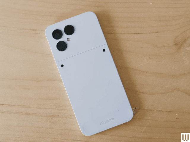 Image may contain: electronics, mobile phone and phone