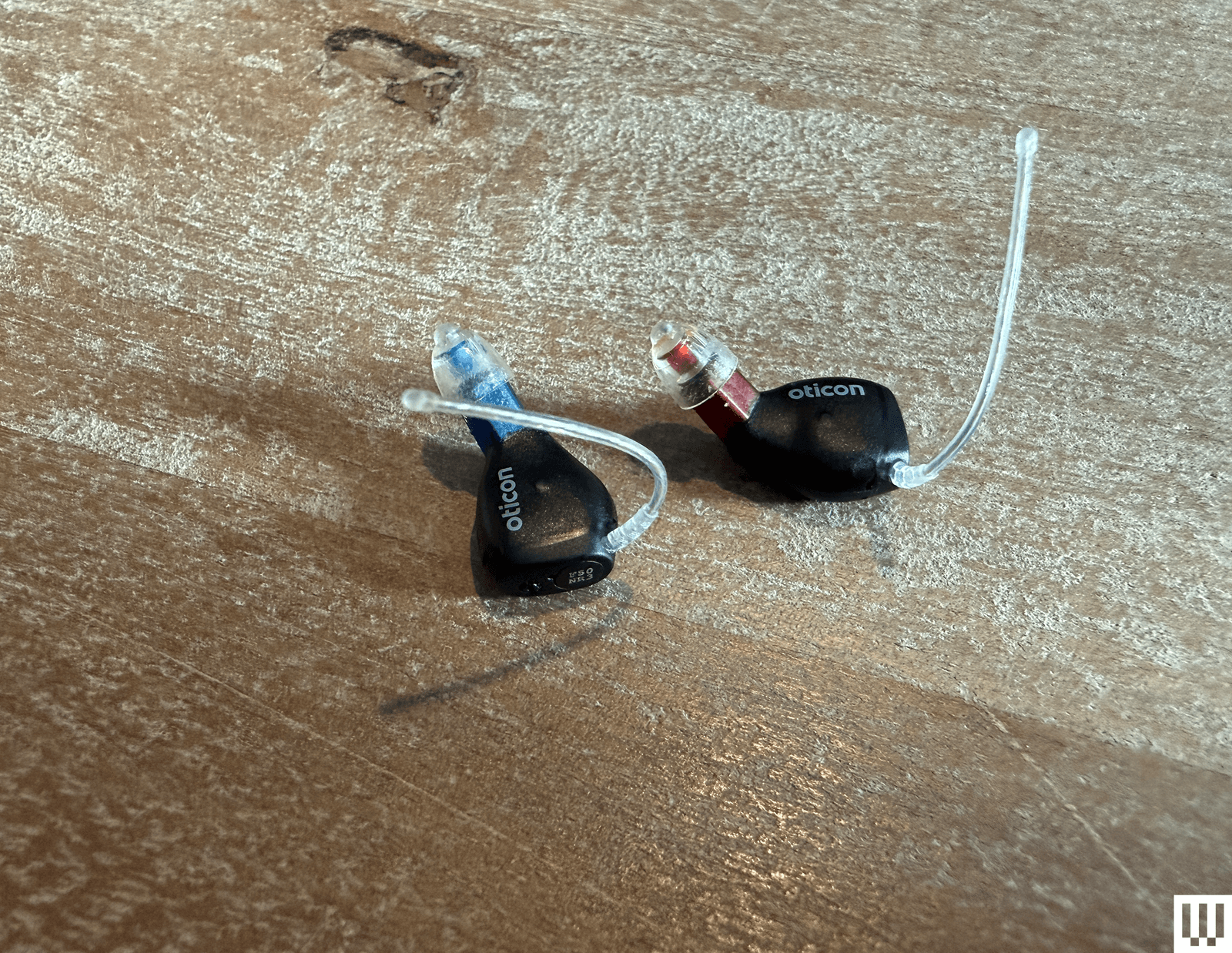 The image may contain a shovel, an electronics adapter tool, and a water device