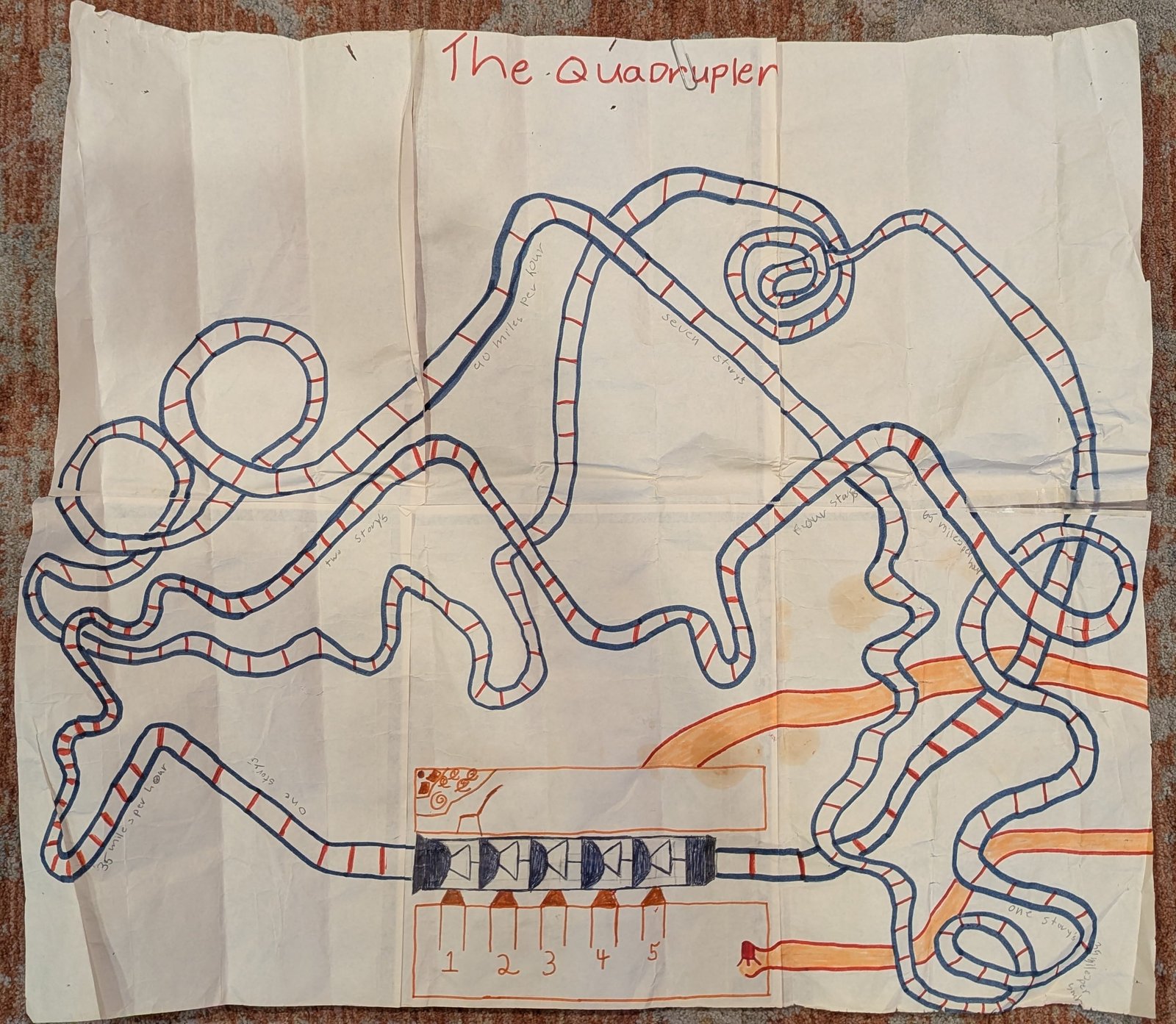 The Quadrupuler roller coaster blueprints drawn in marker