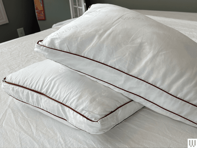 Image may contain: pillow, home decor, cushion, bed, furniture, linen