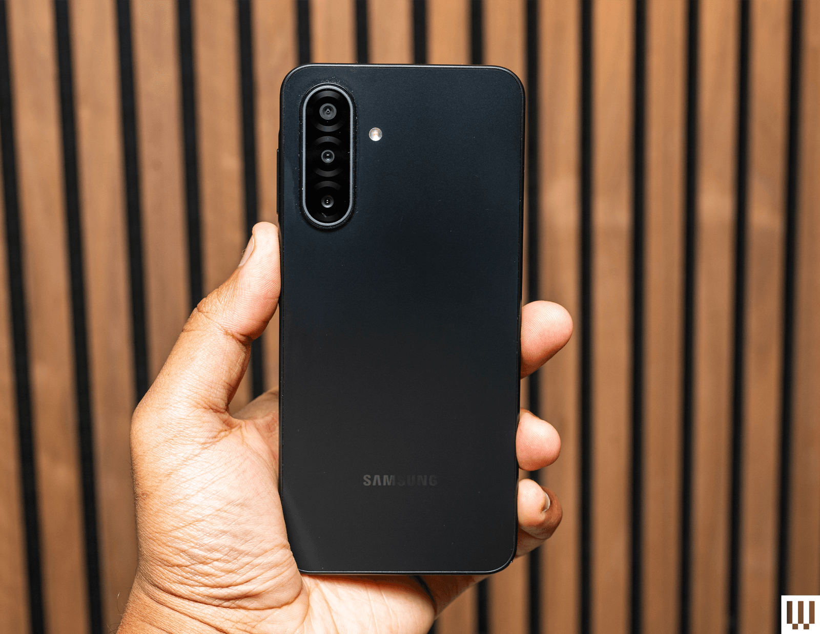 Image may contain electronics, mobile phone, iPhone and photography