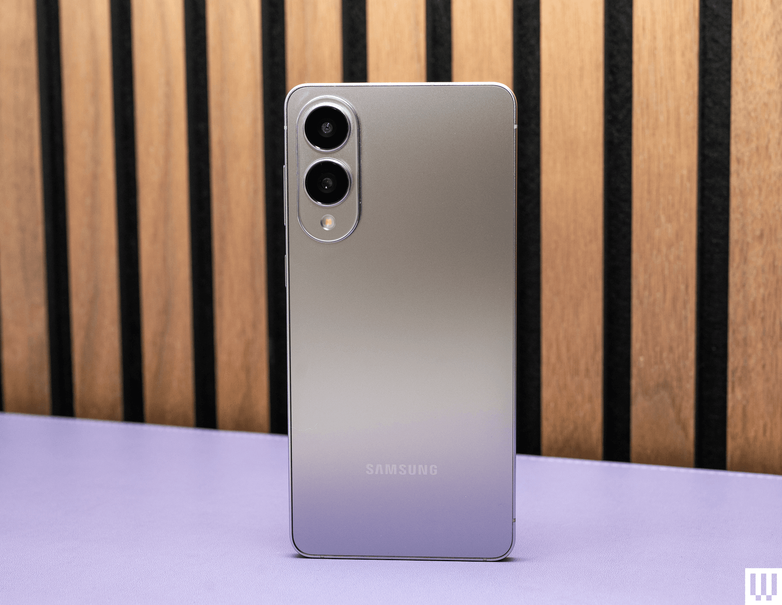 Image may contain mobile phone and telephone electronics