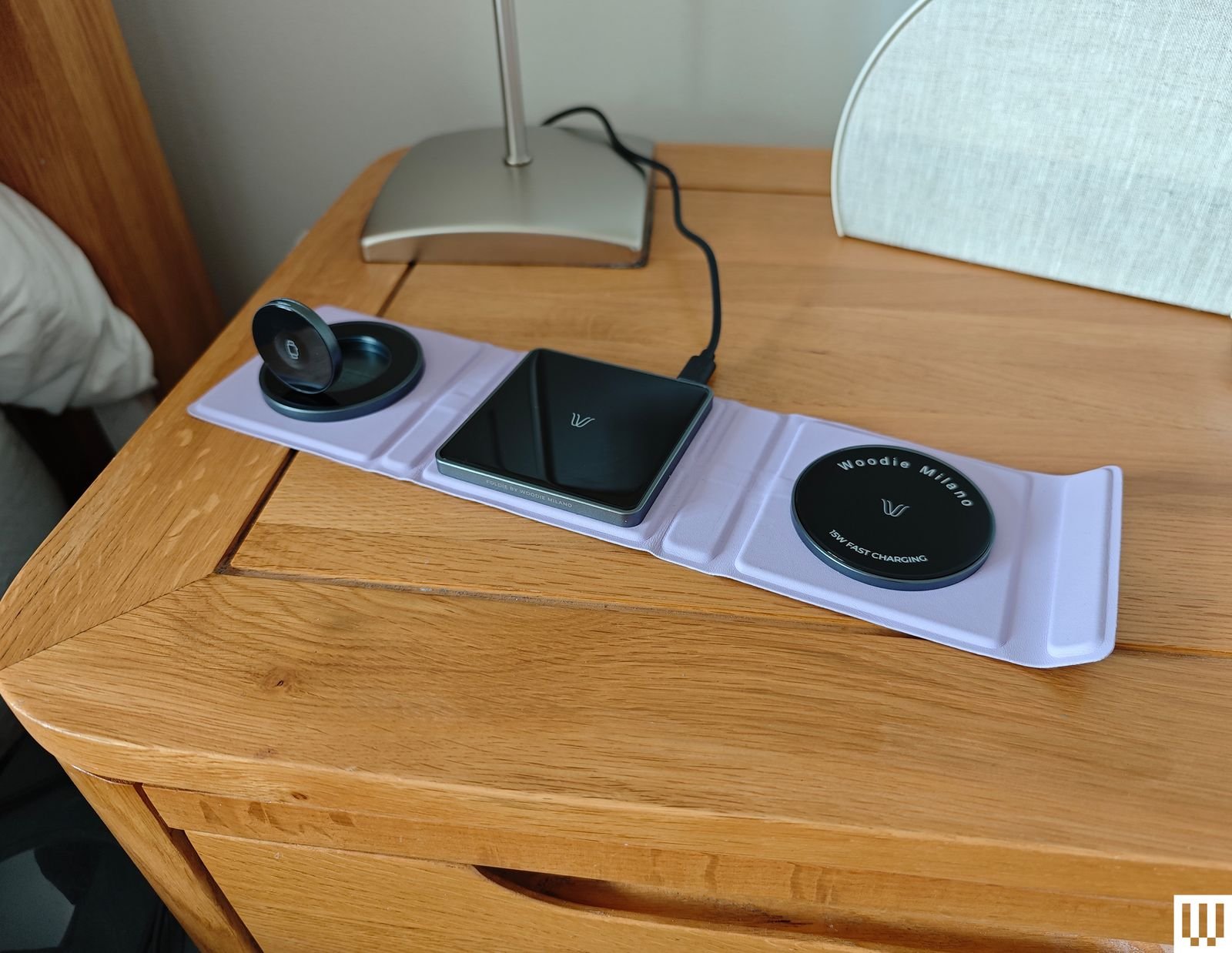 Top view of the Milano Milano Foldi, a small unfolded purple pad with 3 sections for wireless charging of devices