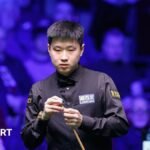 Players Championship: Zhao Xintong produces a brilliant finish to beat John Higgins