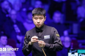 Players Championship: Zhao Xintong produces a brilliant finish to beat John Higgins