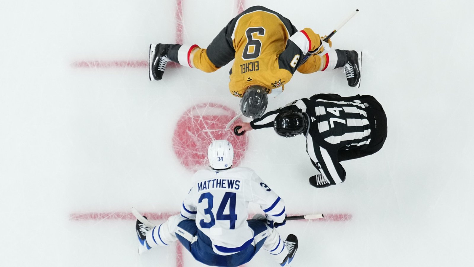 No. 9 Jack Eichel of the Vegas Golden Knights faces No. 34 Auston Matthews of the Toronto Maple Leafs during the second period at T-Mobile Arena. 