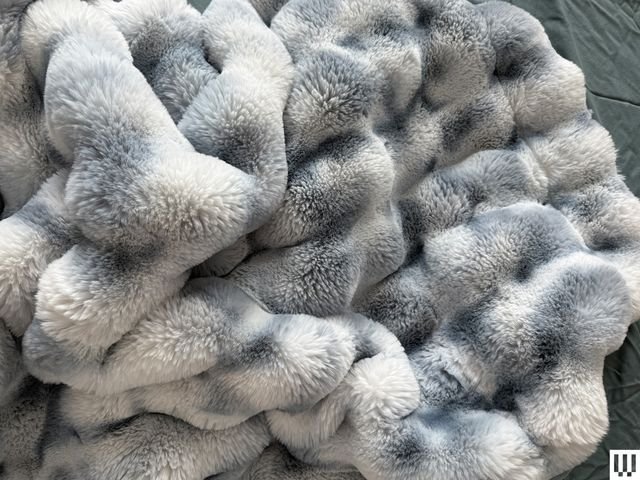 Image may contain: clothing, fur, animal, bear, mammal and wildlife