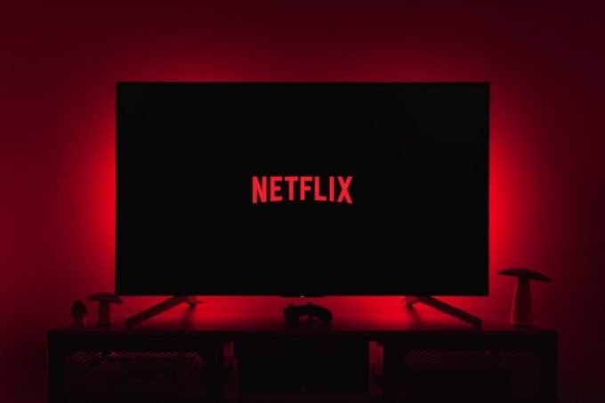 netflix logo on black screen with red backlight