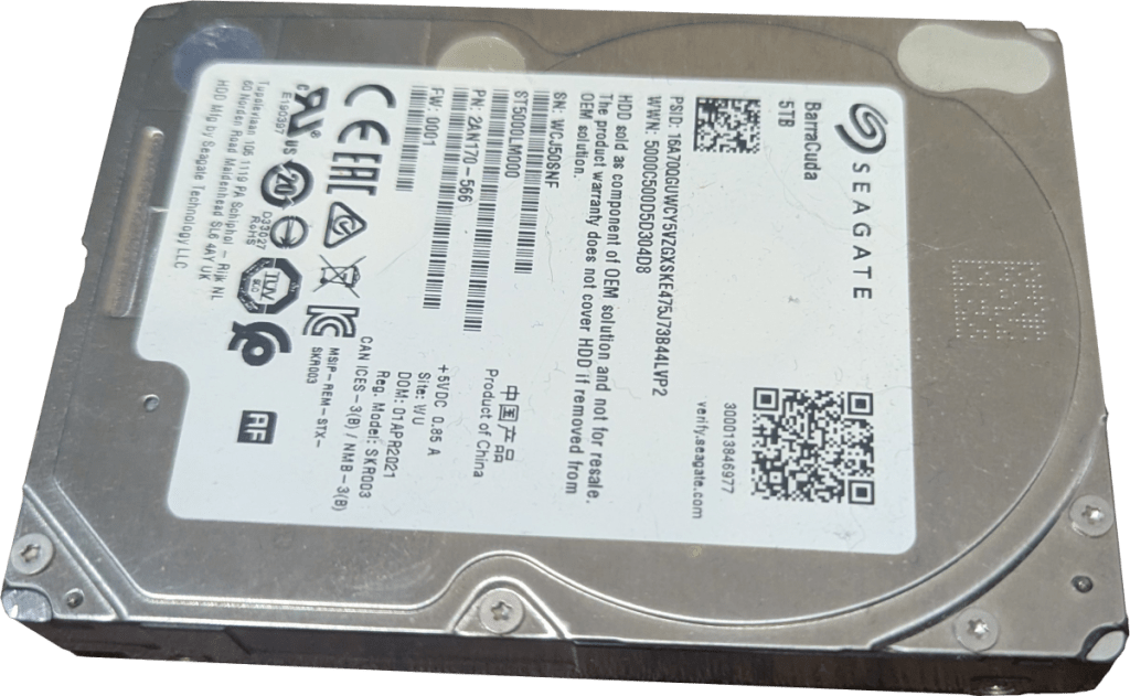 A Seagate Barracuda 5TB hard drive, showing the label with model and product information.