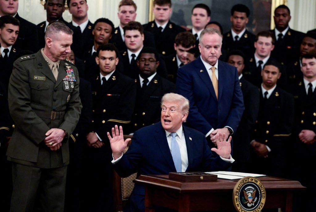 WATCH: Trump presents Commander-in-Chief’s Trophy to Navy’s football team, says Hegseth and Cain are in the Situation Room