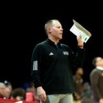 College hoops fans attack Travis Steele as RedHawks HC blasts DJ speakers in fiery screams