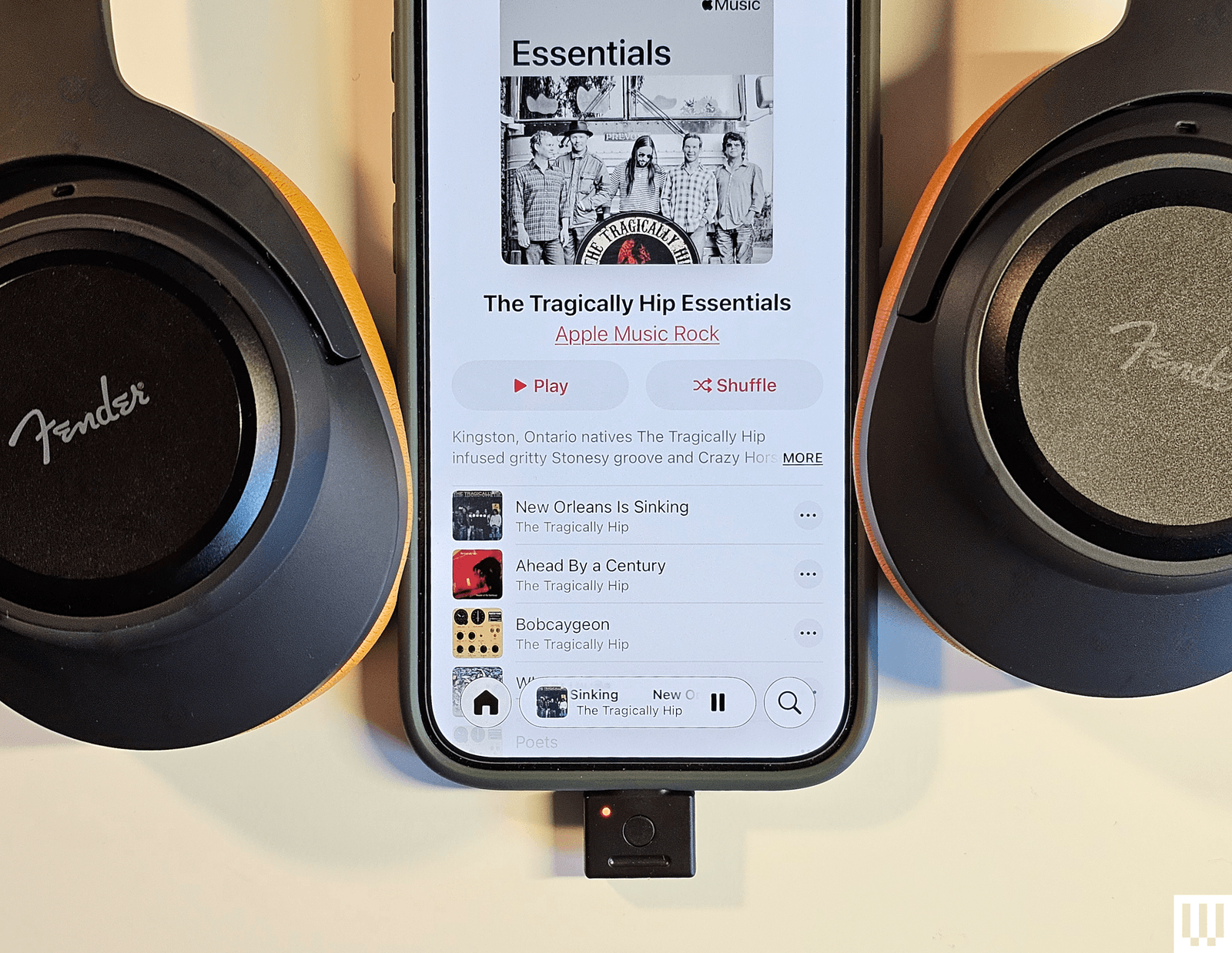 The image may contain Michael Rooker, Branco Melo La Barca Electronics, a cell phone and a speaker