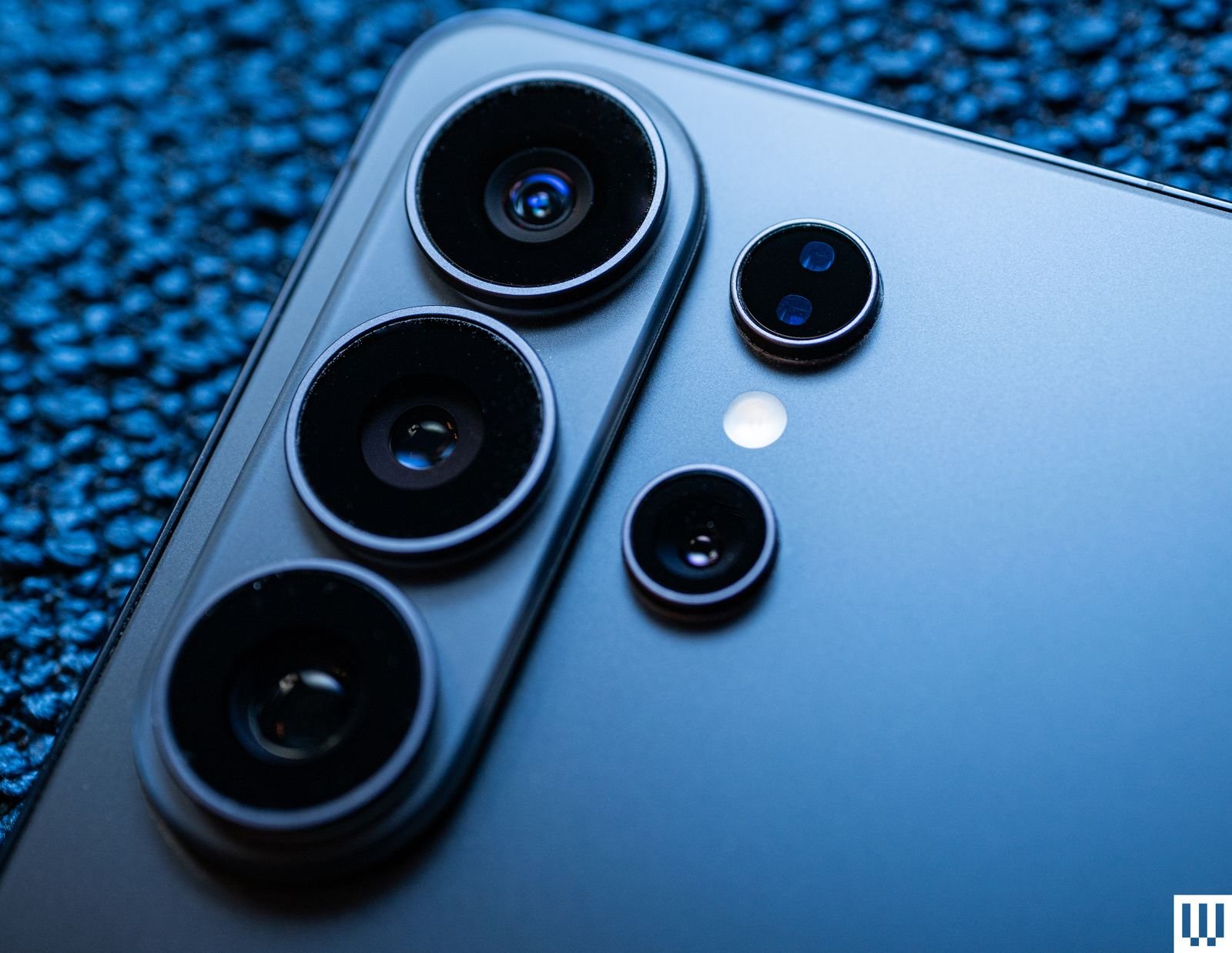 The image may contain electronics and a camera lens