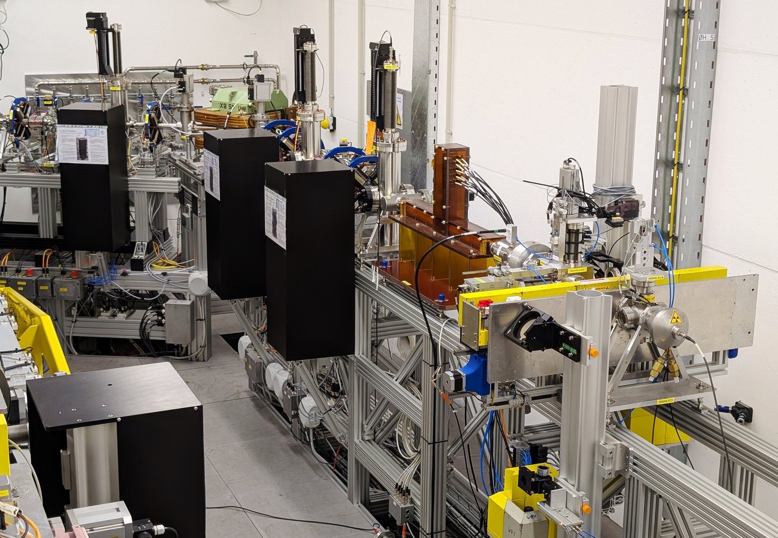 A photo showing a row of experimental electronic equipment on racks